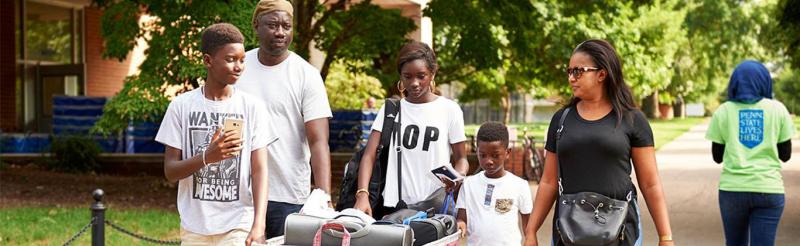 Family helping student move in on arrival day
