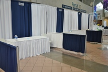 Career fair booth on the concourse level in the Bryce Jordan Center