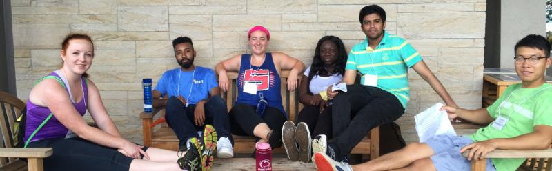 Group of Residence Life Coordinators sitting around a table