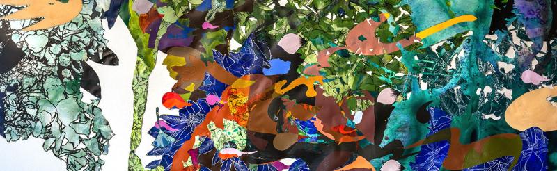 A paper collage of floral and fauna colors and patterns
