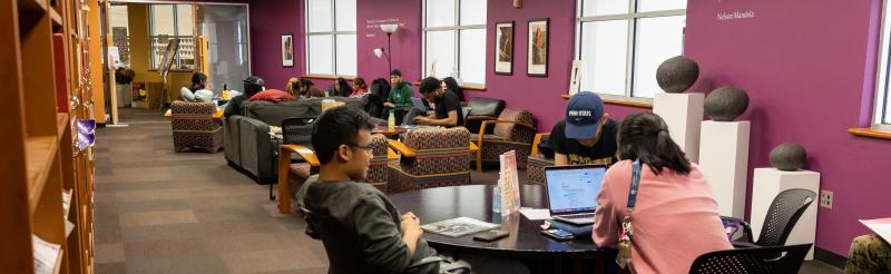 Students sitting inside the Paul Robeson Cultural Center