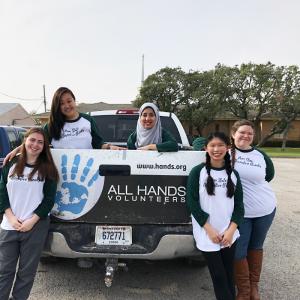 Students helping clean up during PSAB in Houston