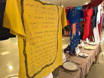 Photo showing Clothesline Project and Empty Place at the Table displays