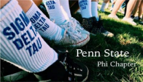 Sigma Delta Tau branded sock closeup on a playing field