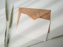 White card and envelope sitting on desk